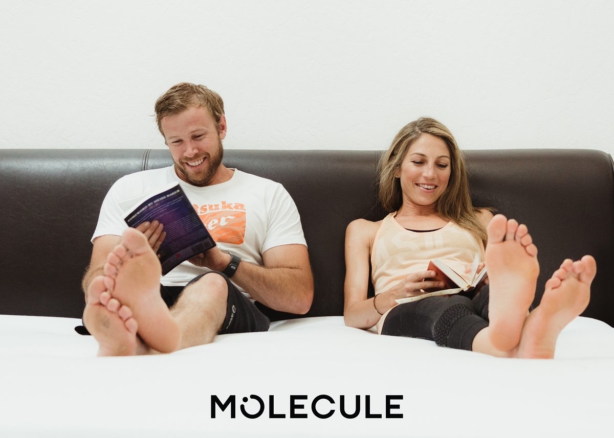 Relaxing on a bed in a box with Molecule branding
